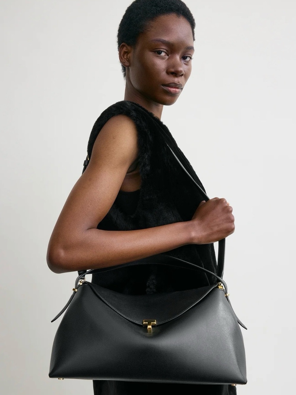 TOTEME T-Lock Leather Top Handle in Black